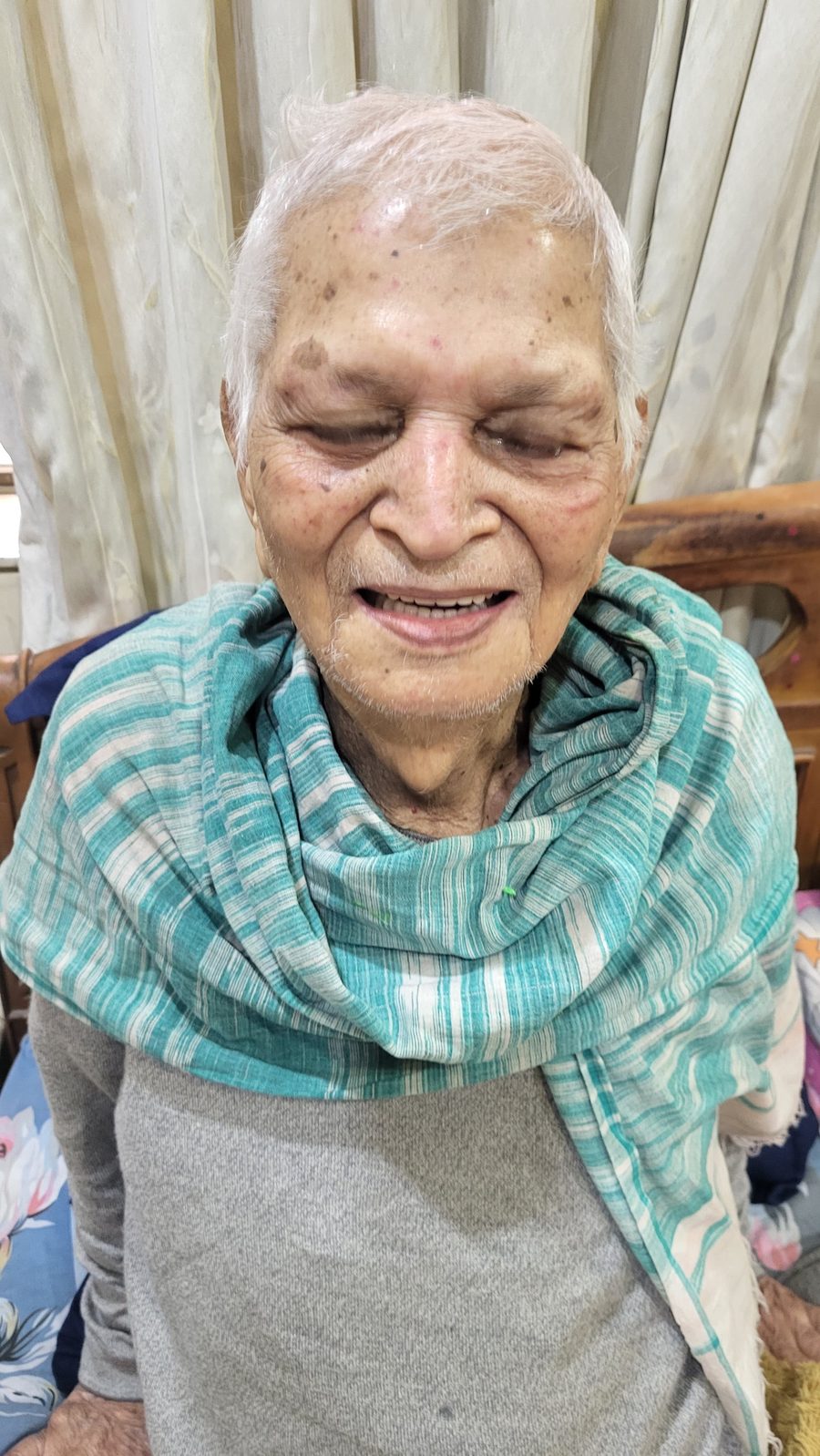 An elderly patient cared for during an at-home dental visit